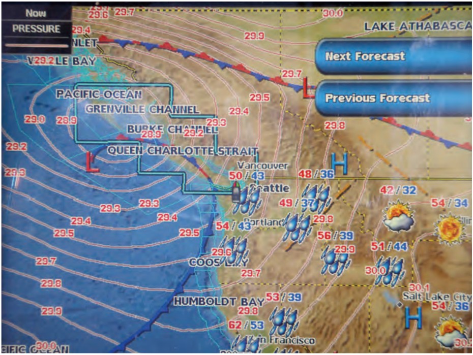 A surface-analysis map shows the low pressure and frontal system responsible for a windy Saturday morning.
