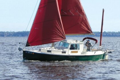 Mark and Suzanne Nye sail their Nimble Arctic 25, Baby Grande, on Florida’s St. Johns River, where it can sometimes get cold enough in winter for them to appreciate the shelter offered by the pilothouse.
