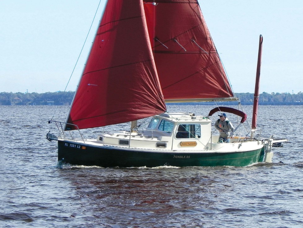 Mark and Suzanne Nye sail their Nimble Arctic 25, Baby Grande, on Florida’s St. Johns River, where it can sometimes get cold enough in winter for them to appreciate the shelter offered by the pilothouse.