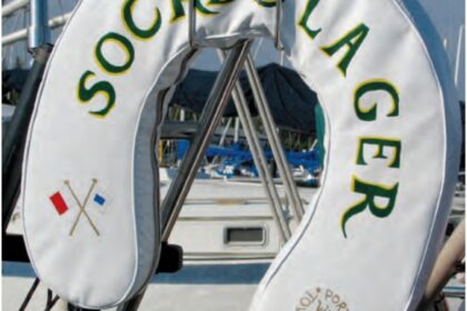 Safety regulations require boats to carry throwable flotation devices but are silent on their color or decoration. Karen used the loophole to artistic advantage.