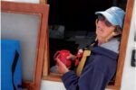 woman on a sailboat