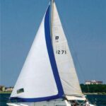 The Pearson 26, Pied Piper, owned by Bill Snow, heels to a fine sailing breeze on Oklahoma’s Grand Lake O’ the Cherokees.