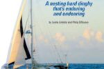 Bacio, the authors’ modified Chameleon nesting dinghy, fits aboard Carina between the mast and the dodger.
