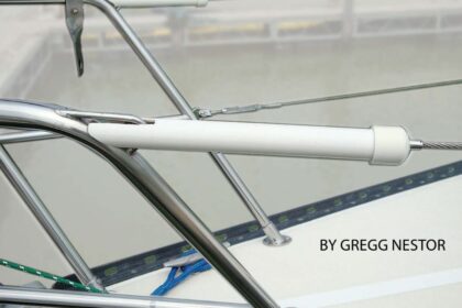 A rigid cover over a lifeline turnbuckle protects sails against chafe and from being snagged by cotter pins or rings.