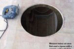 Measure twice; cut once. Bob used a jigsaw with a ceramic-cutting blade to cut the hole for his hatch.