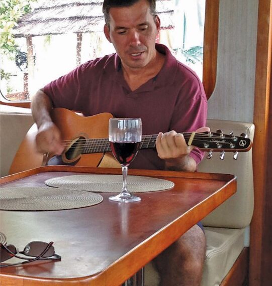 man playing a guitar