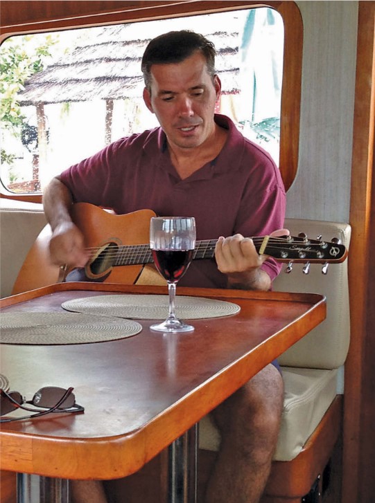 man playing a guitar