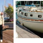 photo of an elderly couple and a sailboat at dock.