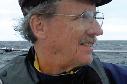 Elderly man on a boat at sea
