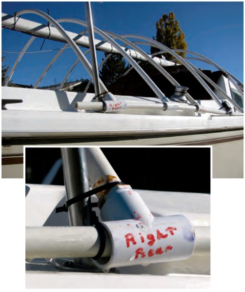 It’s made of inexpensive PVC pipe — easy to erect and easy to store. The bows are connected at their ends by another pipe run through tees, top, and secured to deck fittings with cable ties, bottom.