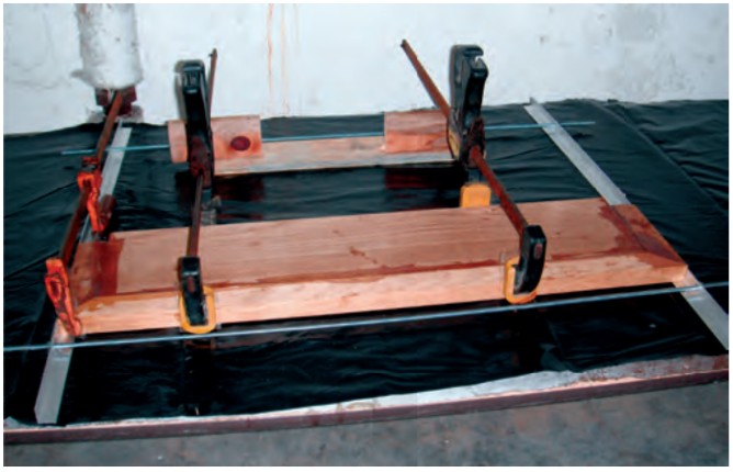 With his combination of clamps, Dave was able to put the squeeze on three edges of the table leaf.