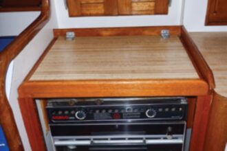 Carl’s Origo stove fit nicely into the space formerly occupied by a fixed stovetop and an air conditioner.