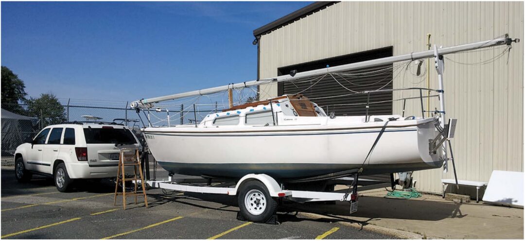Boat, trailer, and tow vehicle make a handsome matched set at the Quantico Marina washrack.