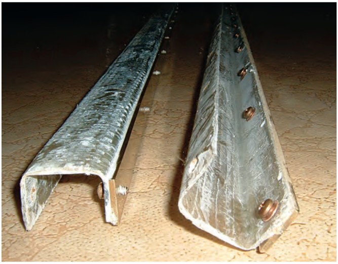 Ben made his fiberglass companionway-hatch slides in one piece using a 2 x 4 as a mandrel, then cut them apart with a table saw.