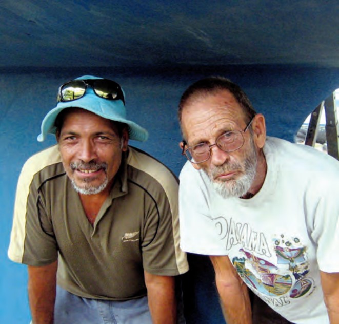 Brian Taylor, at right, purchased the wreck and engaged his friend, Tuki Langdon (and, by extension, many of the local populace) to help him salvage it.