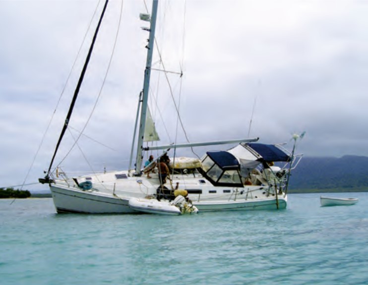 After freeing the boat from the reef in Viani Bay, Brian moved her to Fawn Harbor to careen her and patch persistent leaks.