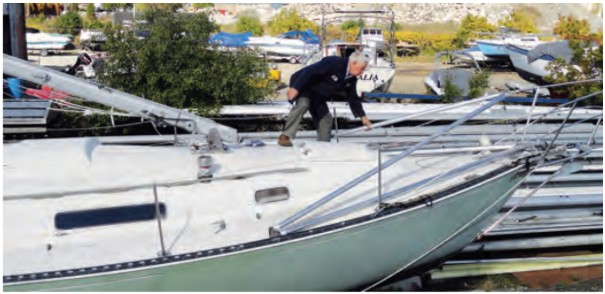 After the mast has been lowered and the after A-frame disconnected from the mast, both frames can be rotated forward so they can be stowed on deck or removed. Once disconnected from the deck, the A-frames “scissor” together for ease of storage.