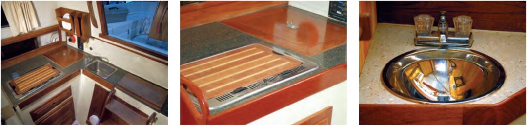 Granite counters brightened up the galley, at left and center, and the head, at right.
