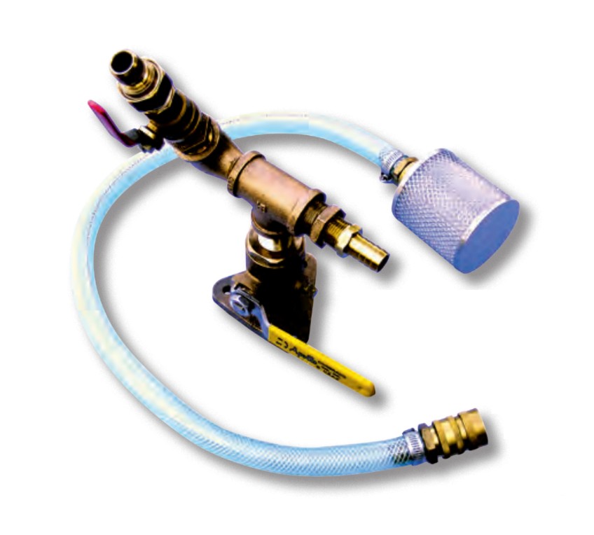 Paul pre-assembled the fittings to his new seacock to test his concept. The hose barb is for the engine cooling-water hose; the red-handled valve is on the auxiliary line.