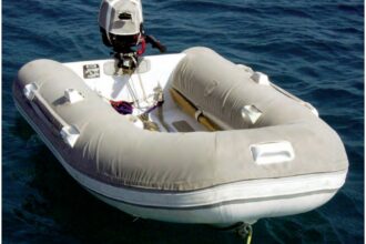 In July 2010, floating behind Cormorant at anchor in Paros, Greece, the dinghy still looks great.