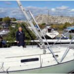 The pivot point of the A-frames is not level with that of the mast, but the apex of the after A-frame, attached to the spinnaker-pole car, accommodates the offset by rising up the mast as the mast is being raised.