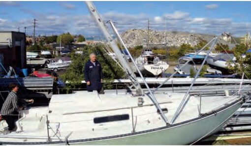 The pivot point of the A-frames is not level with that of the mast, but the apex of the after A-frame, attached to the spinnaker-pole car, accommodates the offset by rising up the mast as the mast is being raised.