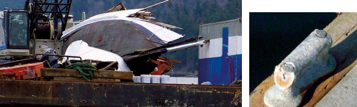 The explosion split the boat’s hull down the stem, above, and blew off the deck with enough force to shear the ears off a dock cleat, at right.