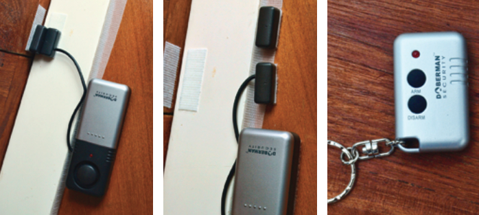 A magnetic-switch alarm that connects the switch to the alarm unit with a wire, at left and center, allows some flexibility with the installation as the alarm can be mounted out of the way of the entrance. This model is operated by a remote control, at right.