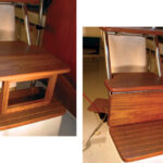 Deployed, at left, the step extension makes a comfortable seat. Folded down, below, it becomes part of the cabin’s teak décor.
