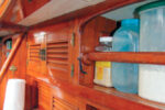 Aboard Nine of Cups, prisms direct daylight into places, like this corner of the galley, that might otherwise be in shadow.