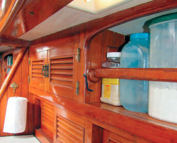Aboard Nine of Cups, prisms direct daylight into places, like this corner of the galley, that might otherwise be in shadow.