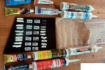 To perform his test, Ferman lined up several caulks and sealants and applied two beads of each, one for a tension test and one for a shear test, to a sample of his acrylic glazing material.