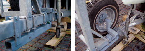 A steel sleeve attached to the trailer’s hitch beam, at left, accommodates a 9-foot hitch extension. The Z-shaped mounting arm, at right, allows the spare wheel to double as a hitch jack, and a much more robust one than the standard equipment.