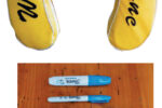 When adhesive-backed vinyl letters refused to stick to the buoy’s vinyl cover, Ferman went to permanent markers and stencils, below.