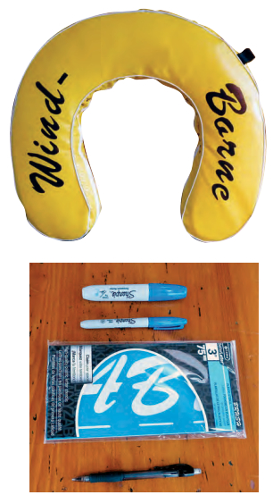 When adhesive-backed vinyl letters refused to stick to the buoy’s vinyl cover, Ferman went to permanent markers and stencils, below.