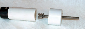 The spike is a stainless-steel machine screw, which Clarence covered with plastic tubing to protect the sail.