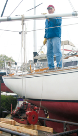 Rob used the boom to lift the engine out of the cabin and lower it to the trailer.