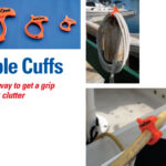 Cable Cuffs come in three sizes (all of them inexpensive) and make quick work of organizing a variety of onboard gear. The large Cable Cuff, at left, holds a coil of line while the small one, below, clips a cord to a lifeline to keep it from being underfoot on deck.