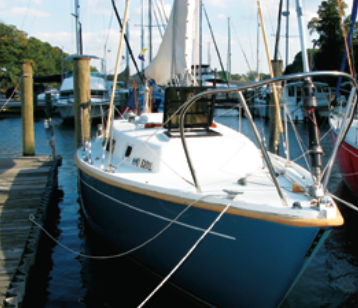 Checkmate rests between races in her slip at Sailor’s Wharf, the small marina attached to Bob and Cindi’s home.
