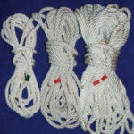 Three-strand docklines look much alike when stowed together in one place. Steve tagged the ends of his with colored tape according to their lengths.