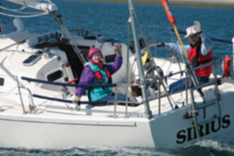 Durkee and Mary Jeanne Richards attempt to outrun the photo boat (an F 24 trimaran) in their J/32, Sirius, on Washington’s Sequim Bay. Sirius is maintained and handled as a go-fast boat and gives all boats in her local racing class a run for the money. Then the Richards add a furling jib, a more robust prop, and beefier anchor tackle, and cruise British Columbia for weeks on end.