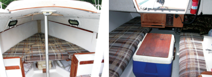 The V-berth occupies most of the area forward of the mast, which is supported by the compression post, at left. The center section of the V-berth can be removed to provide access to the portable toilet beneath. Two small countertops make up the “galley.” At mealtimes, a removable tabletop fits between them to provide a larger work surface. A 50-quart cooler does double duty as a companionway step, at right.