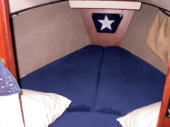 The V-berth is wider than it is long, so tall people will have their feet pinched at the bow.