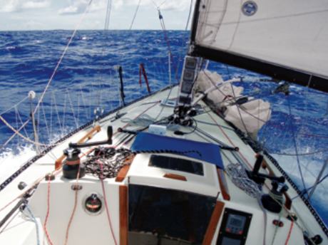 A typical skipper’s-eye view on the TransPac shows Polar Bear plowing a fast furrow across an endless blue ocean.