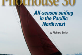 Reefed down, Devon and Penny Blankenship’s Rawson Pilothouse 30, Alcyone, takes a stiff breeze in her stride.