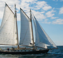 On a bright brisk day, the gaff-rigged Sara B makes a right fine sight as she slips along on Lake Ontario.