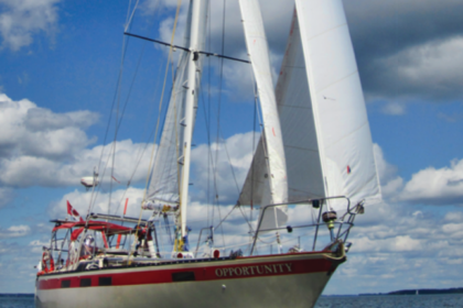 Opportunity, a Corbin 39, takes advantage of a fair breeze and flat water on Adolphus Reach.