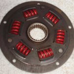 The damper plate is constructed of two plates and springs. The transmission shaft fits into a toothed hole in the center.