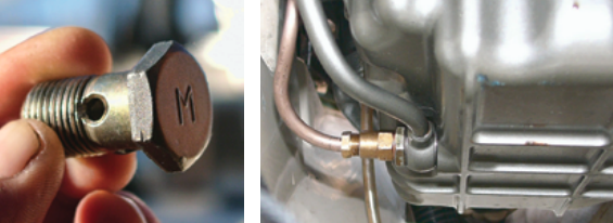 To add a suction line for an oil-change pump, Benjy had the banjo bolt that secures the oil dipstick tube drilled through the “M,” far left. He then attached the pump tube (copper color) to the dipstick assembly, near left.