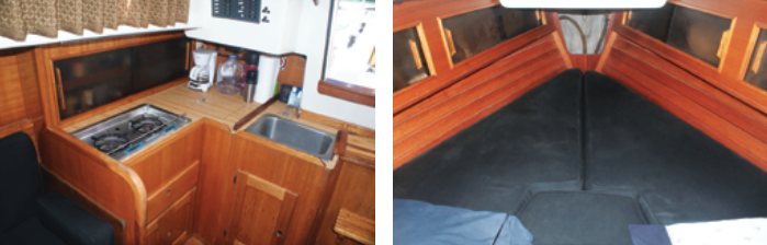 The galley is compact, at left, but the essentials are here: two-burner stovetop, sink, and top-loading icebox. The V-berth is just over 6 feet long and nearly 7 feet wide at the head, at right. The mahogany ceilings are attractive and give the cabin a warm feeling.